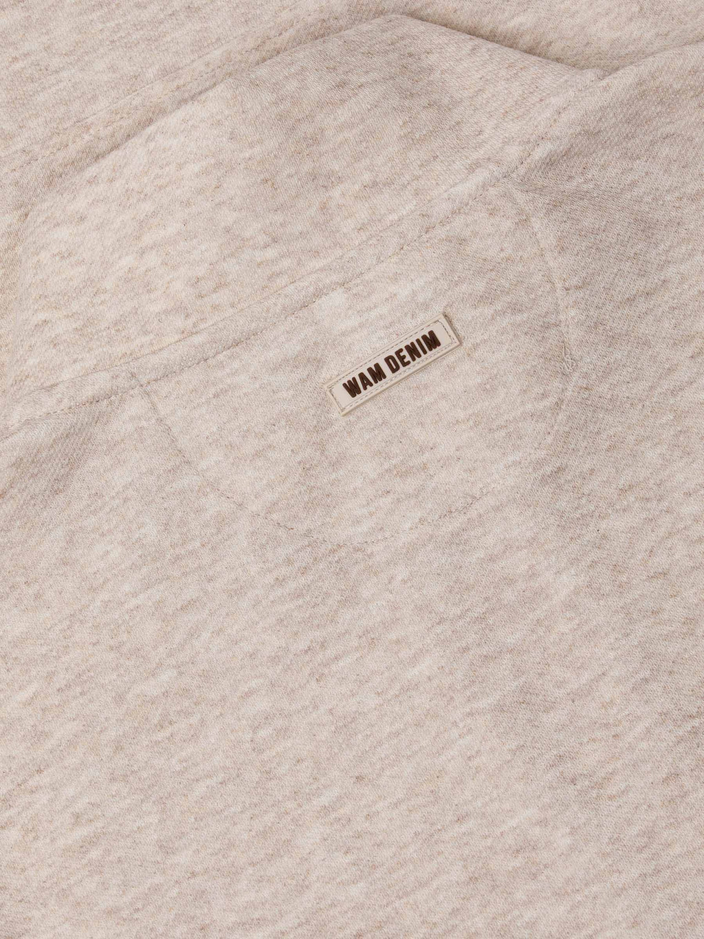 Der beige Lennox-Pullover