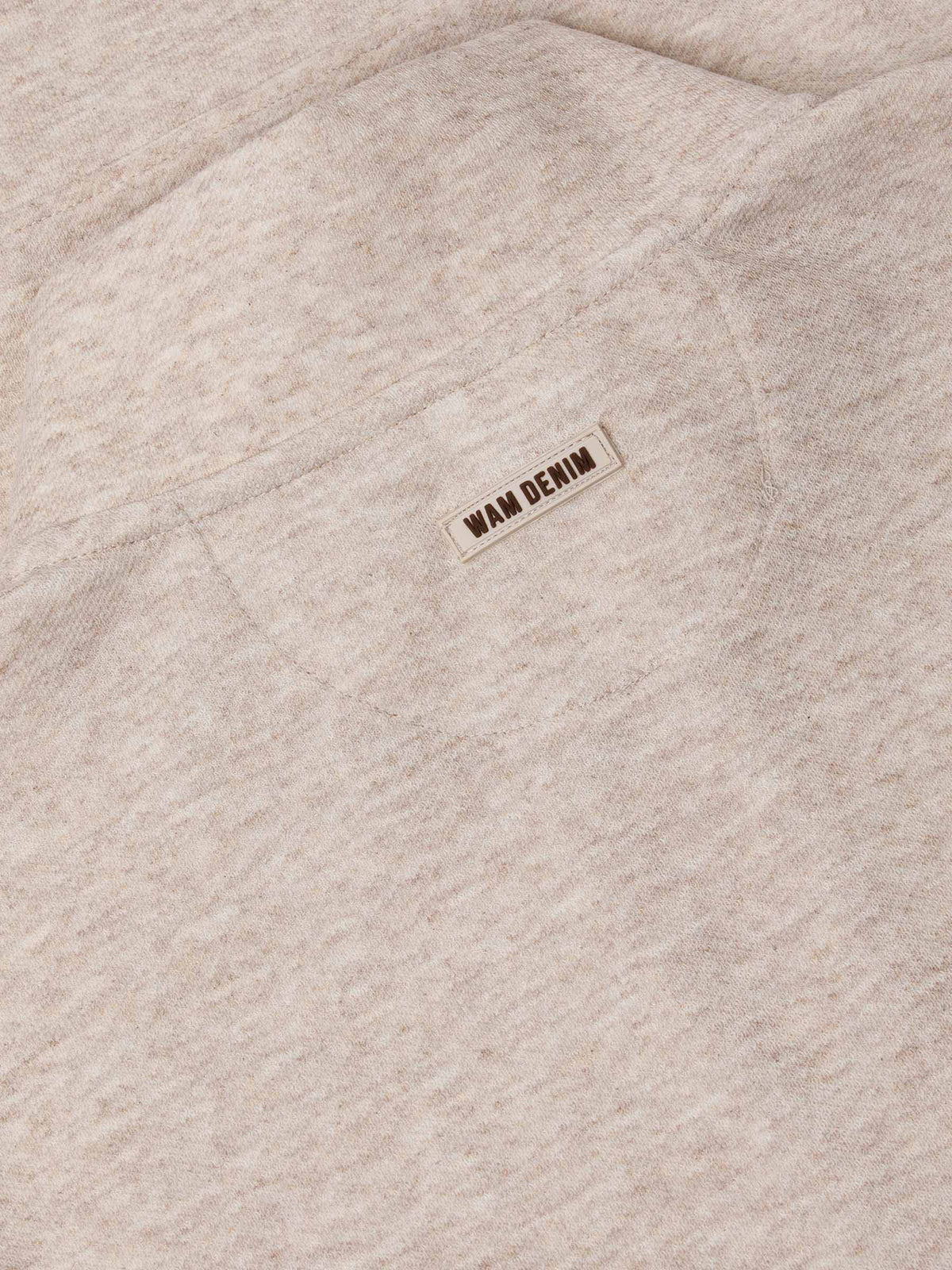 Der beige Lennox-Pullover