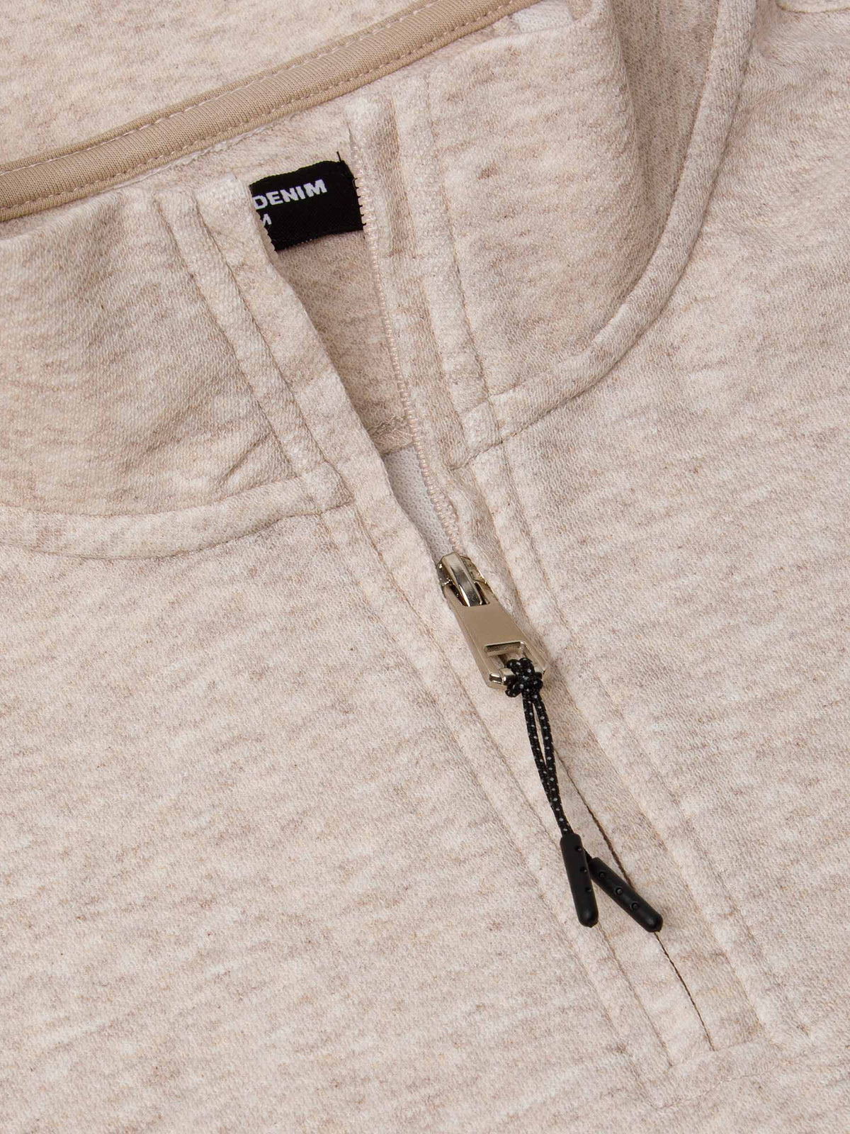 Der beige Lennox-Pullover