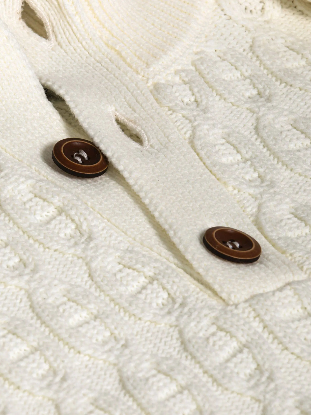 Avon Strickwaren mit cremefarbenem Muster