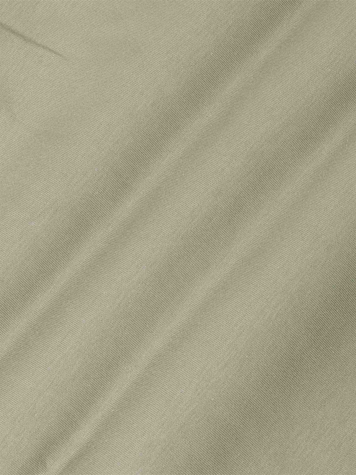 Der hellgrüne Prime-Pullover