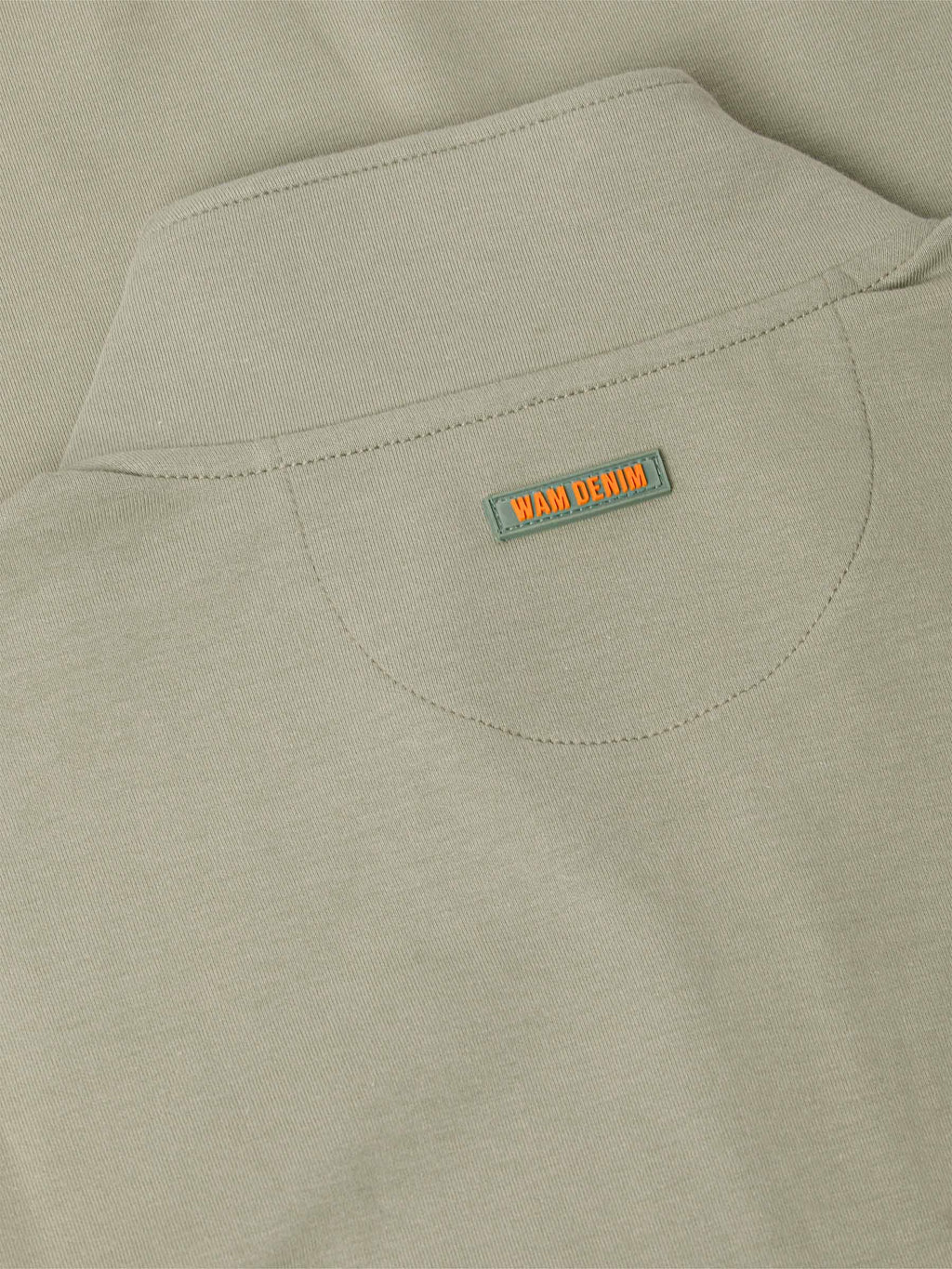 Der hellgrüne Prime-Pullover