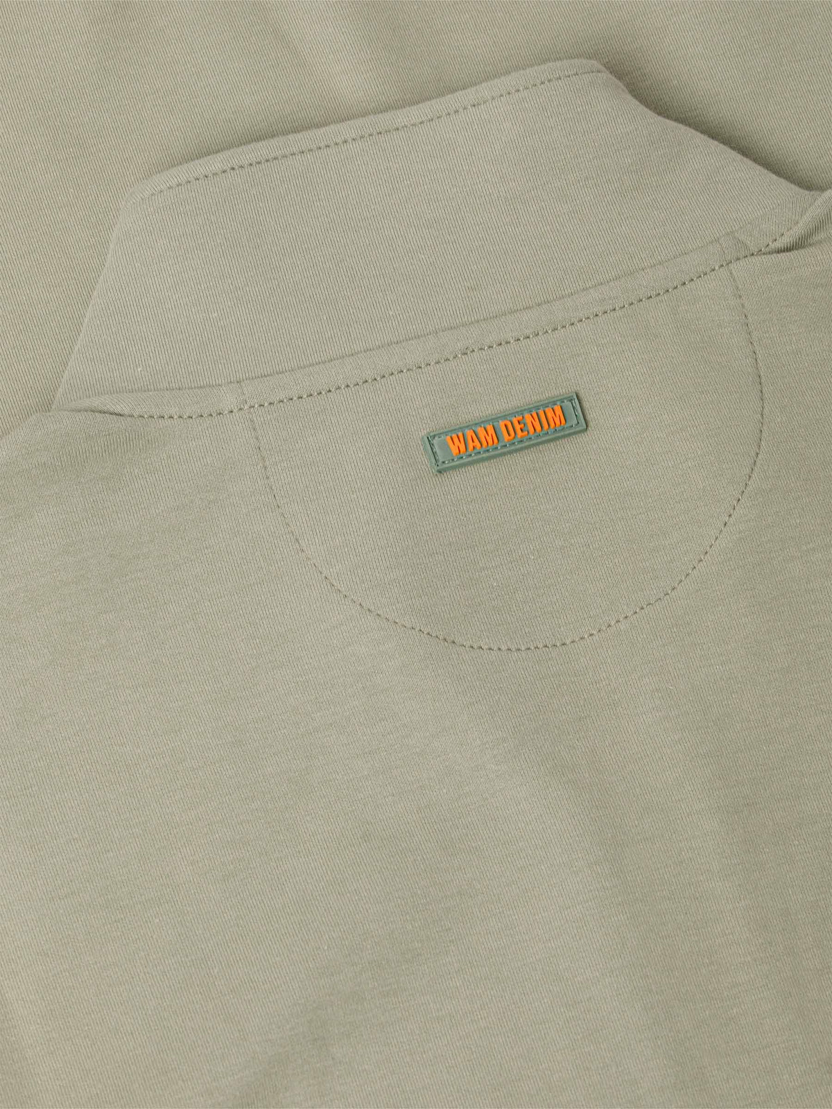 Der hellgrüne Prime-Pullover