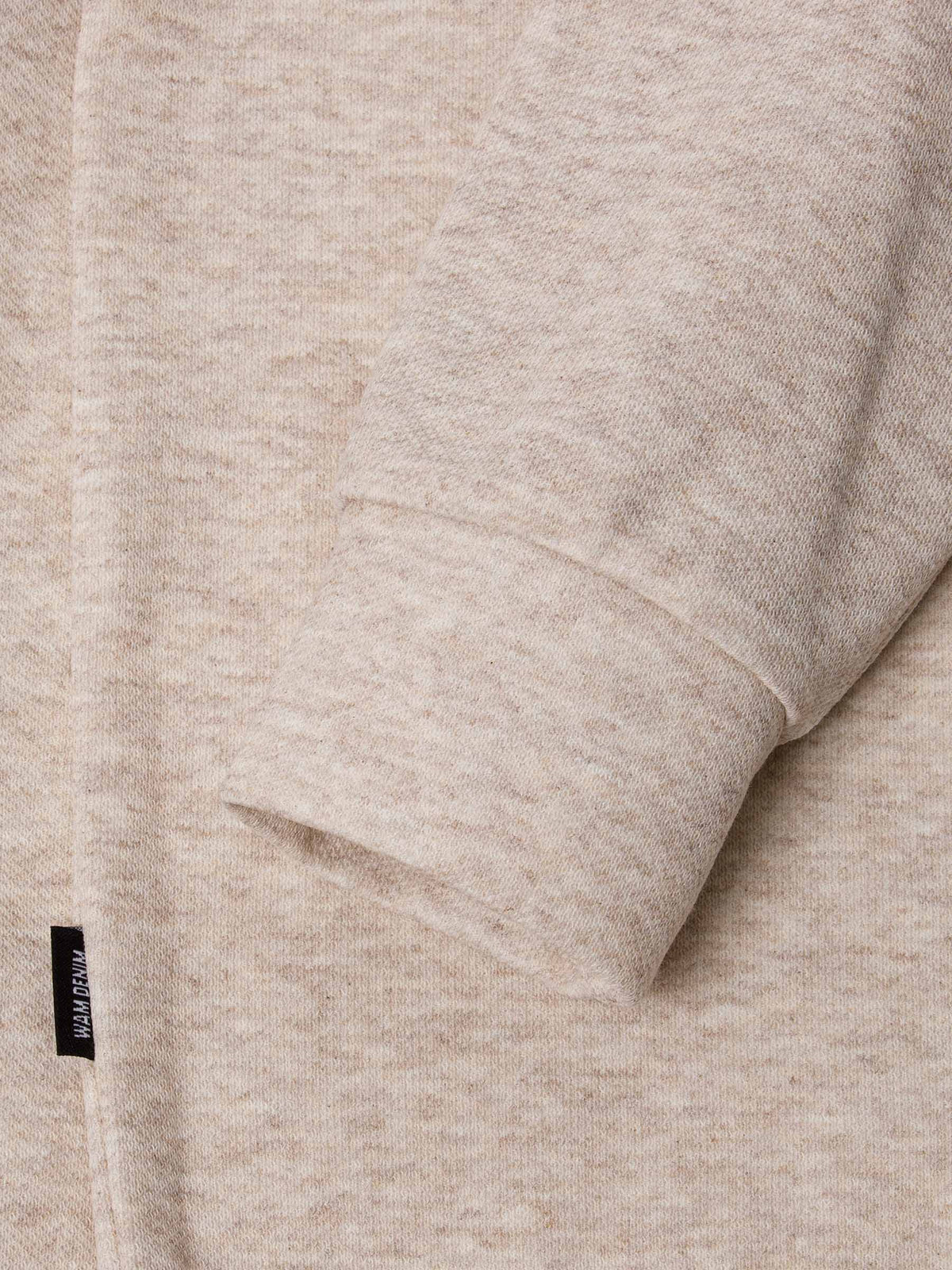 Der beige Lennox-Pullover