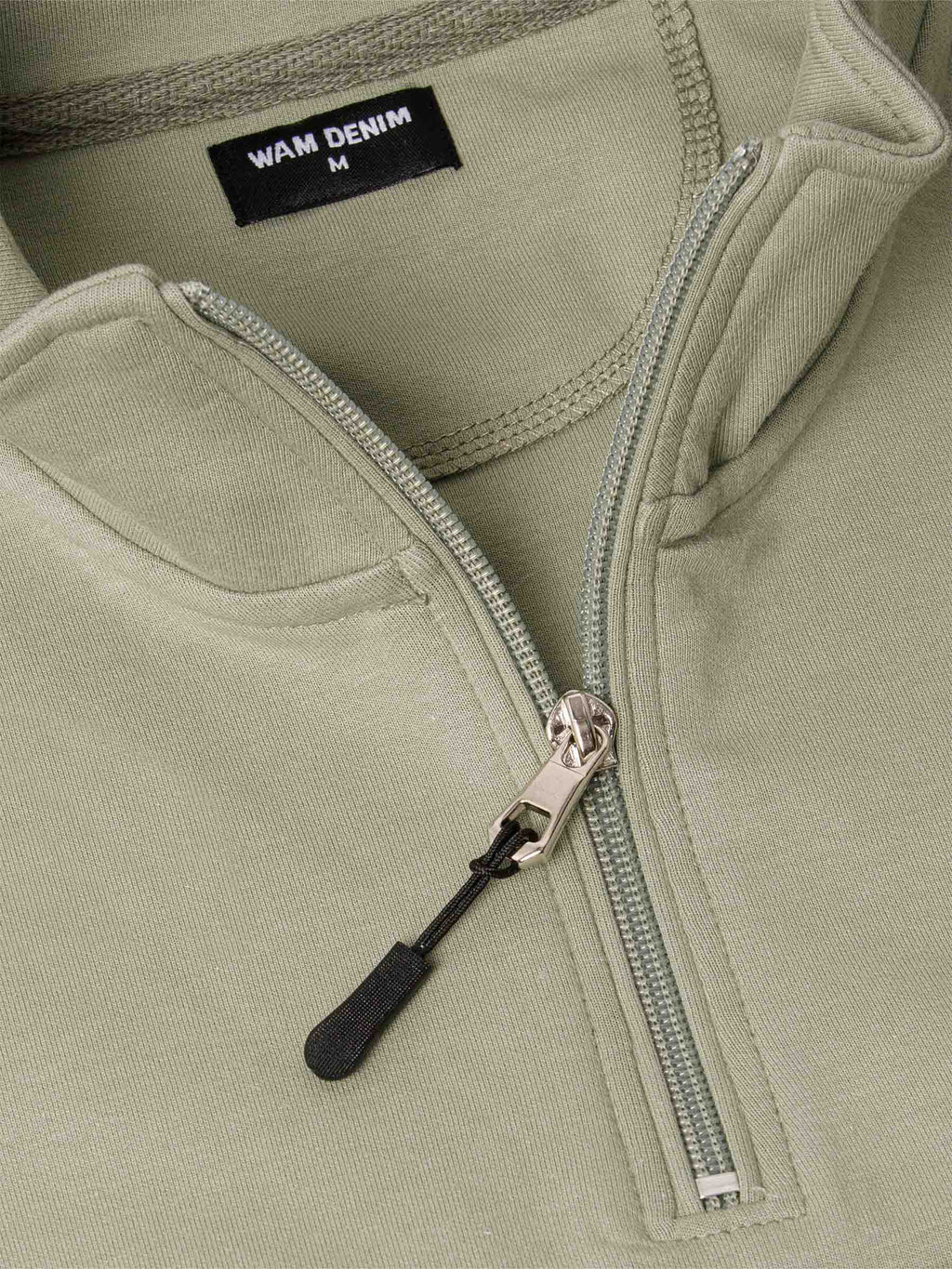 Der hellgrüne Prime-Pullover
