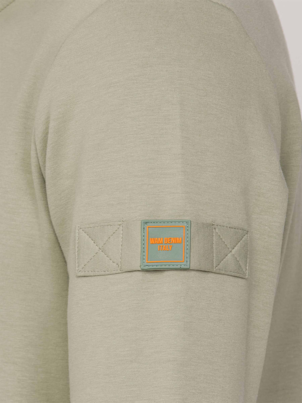 Der hellgrüne Prime-Pullover