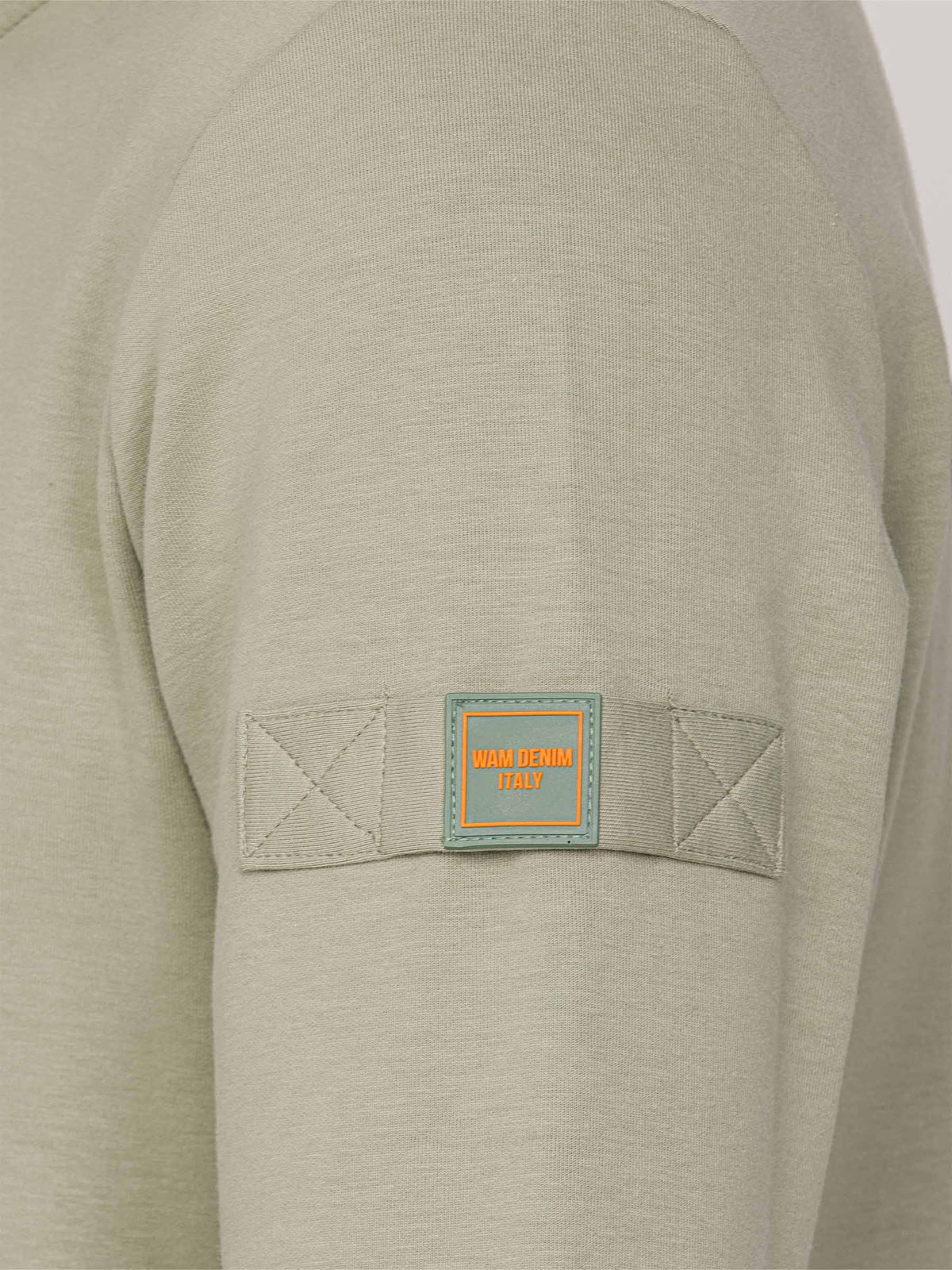 Der hellgrüne Prime-Pullover